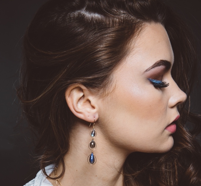 model wearing labradorite triple drop gold earrings