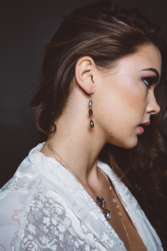 model wearing labradorite triple drop gold earrings