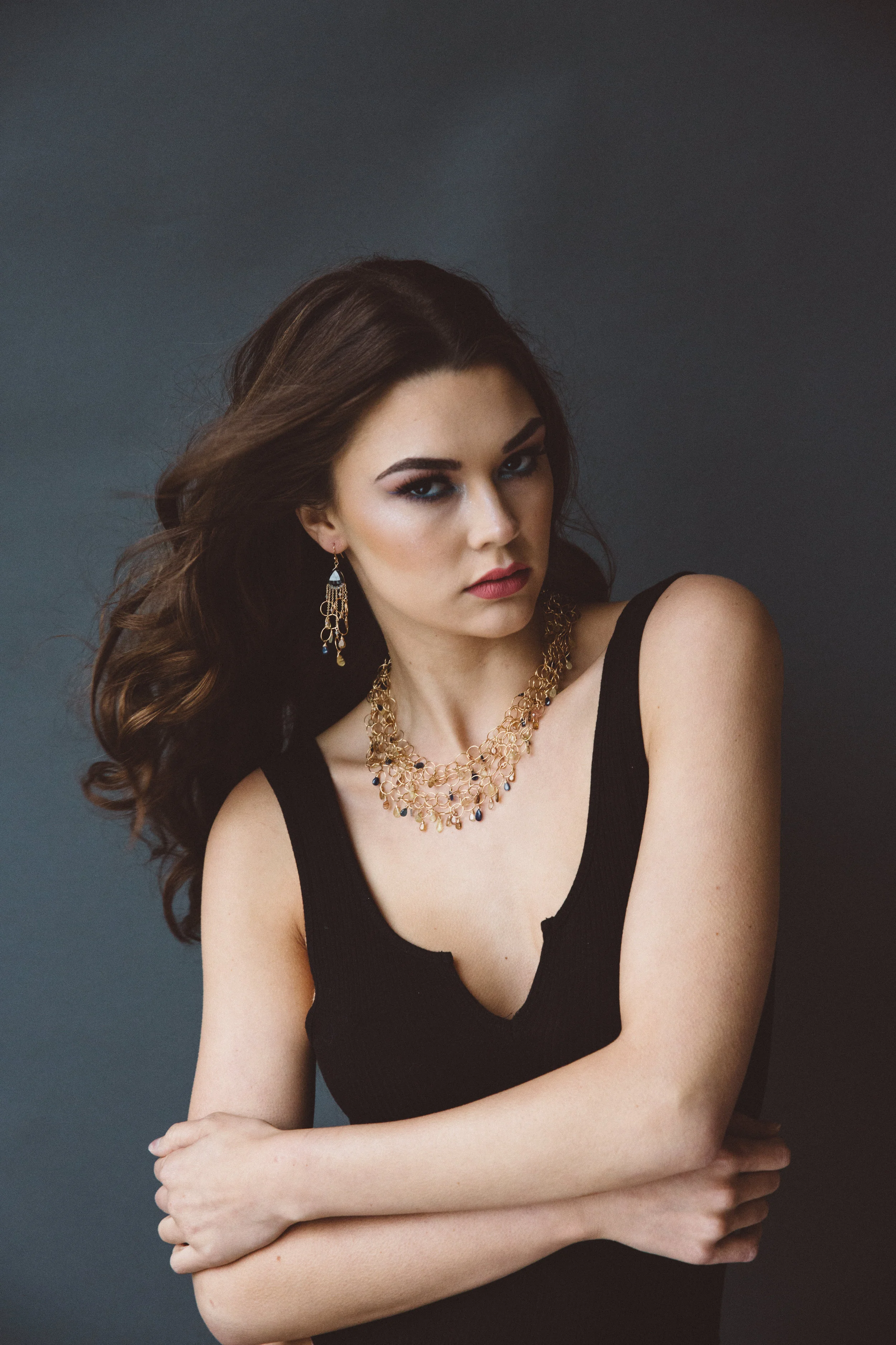 model wearing padparadscha sapphire multi layer gold link necklace