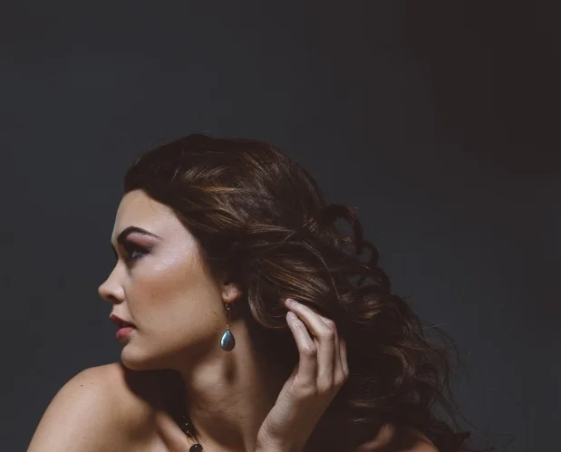 model wearing labradorite teardrop gold earrings