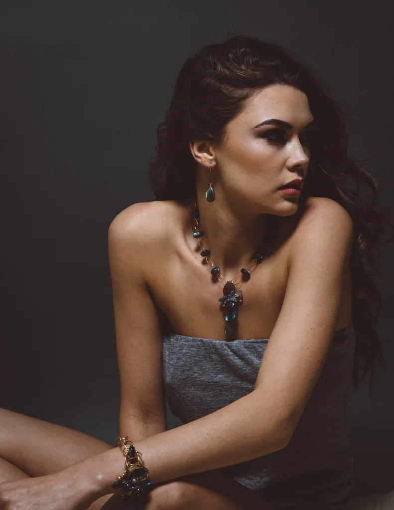 model wearing labradorite teardrop gold earrings