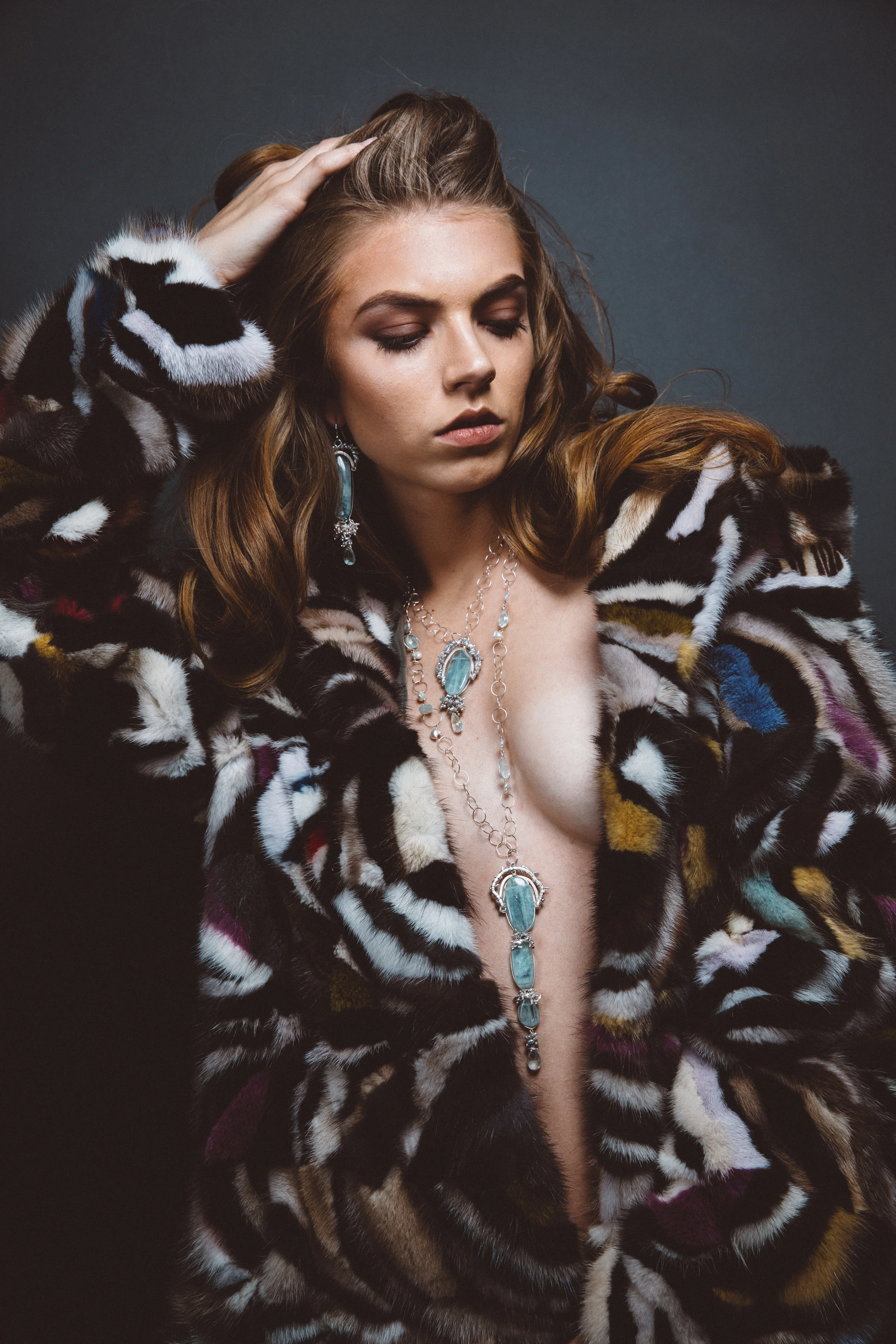 model wearing triple drop aquamarine long necklace