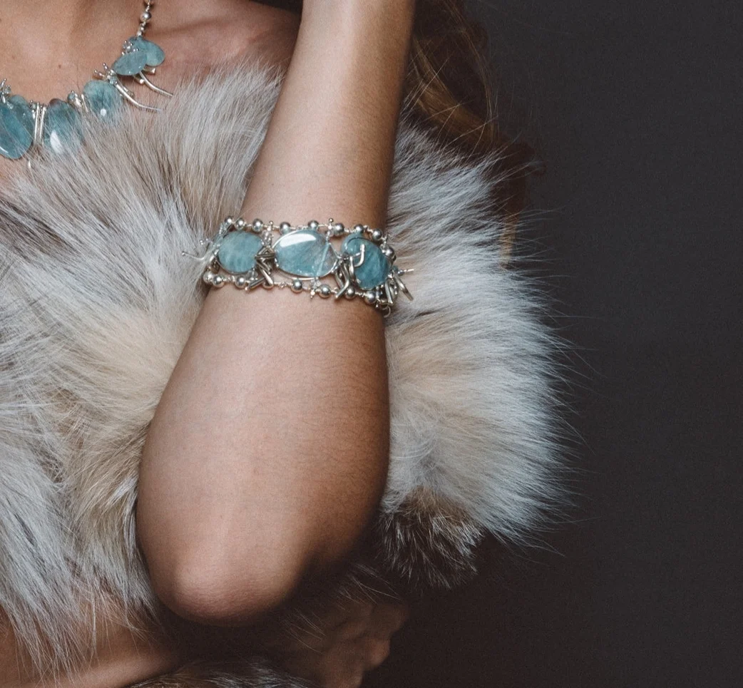 model wearing aquamarine bracelet