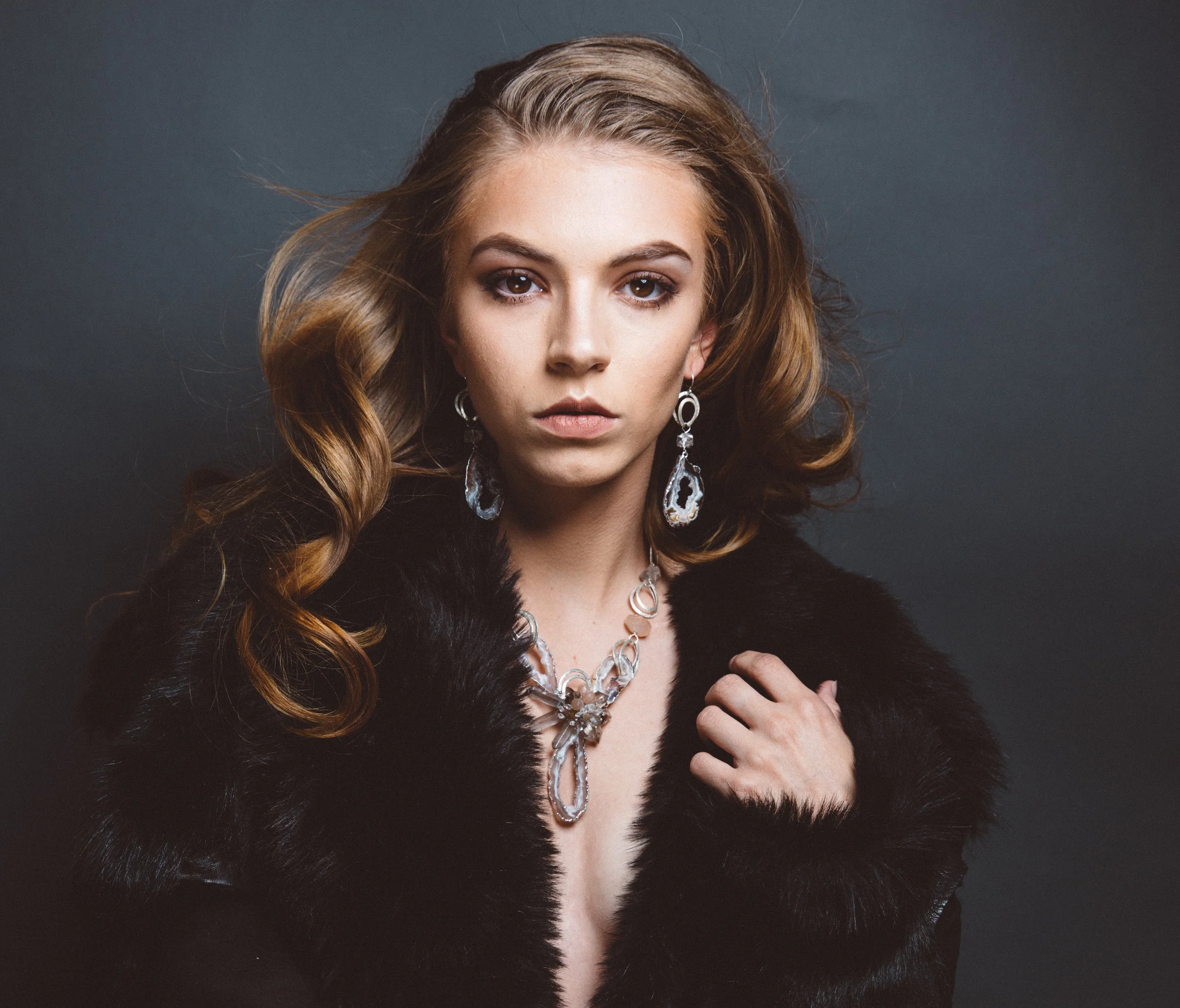 model wearing agate earrings