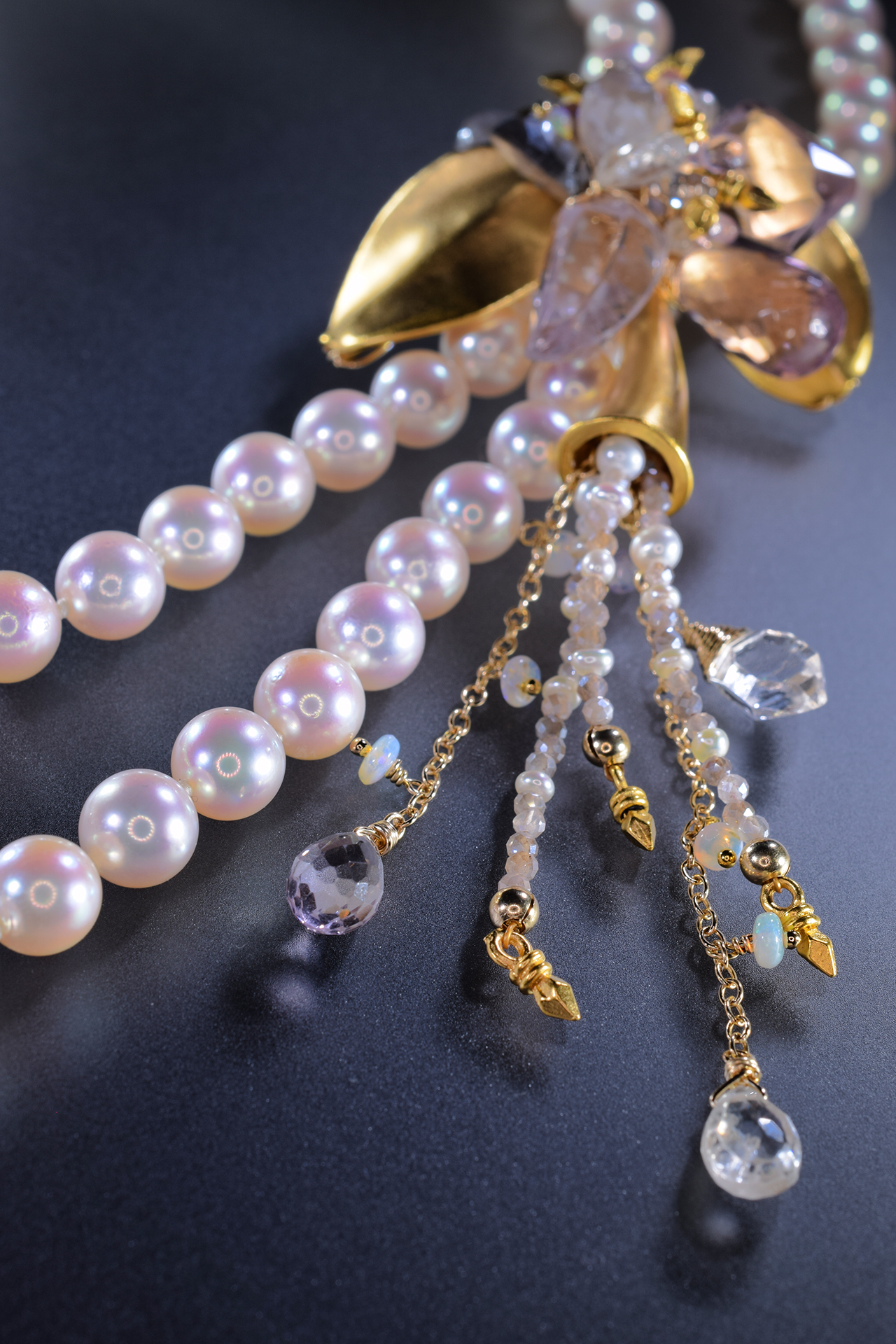 double strand pearl necklace with gemstone accents