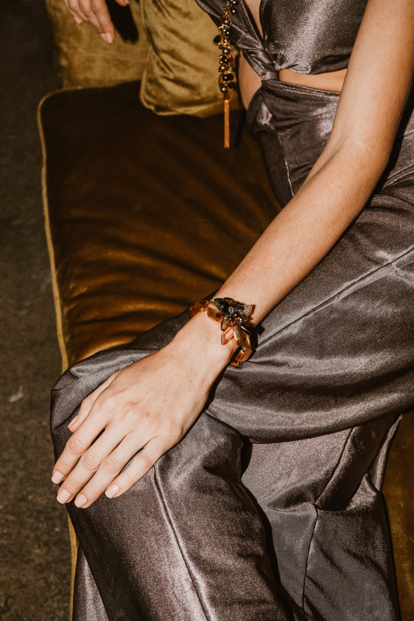 model wearing Gold Link and Tourmaline Bracelet