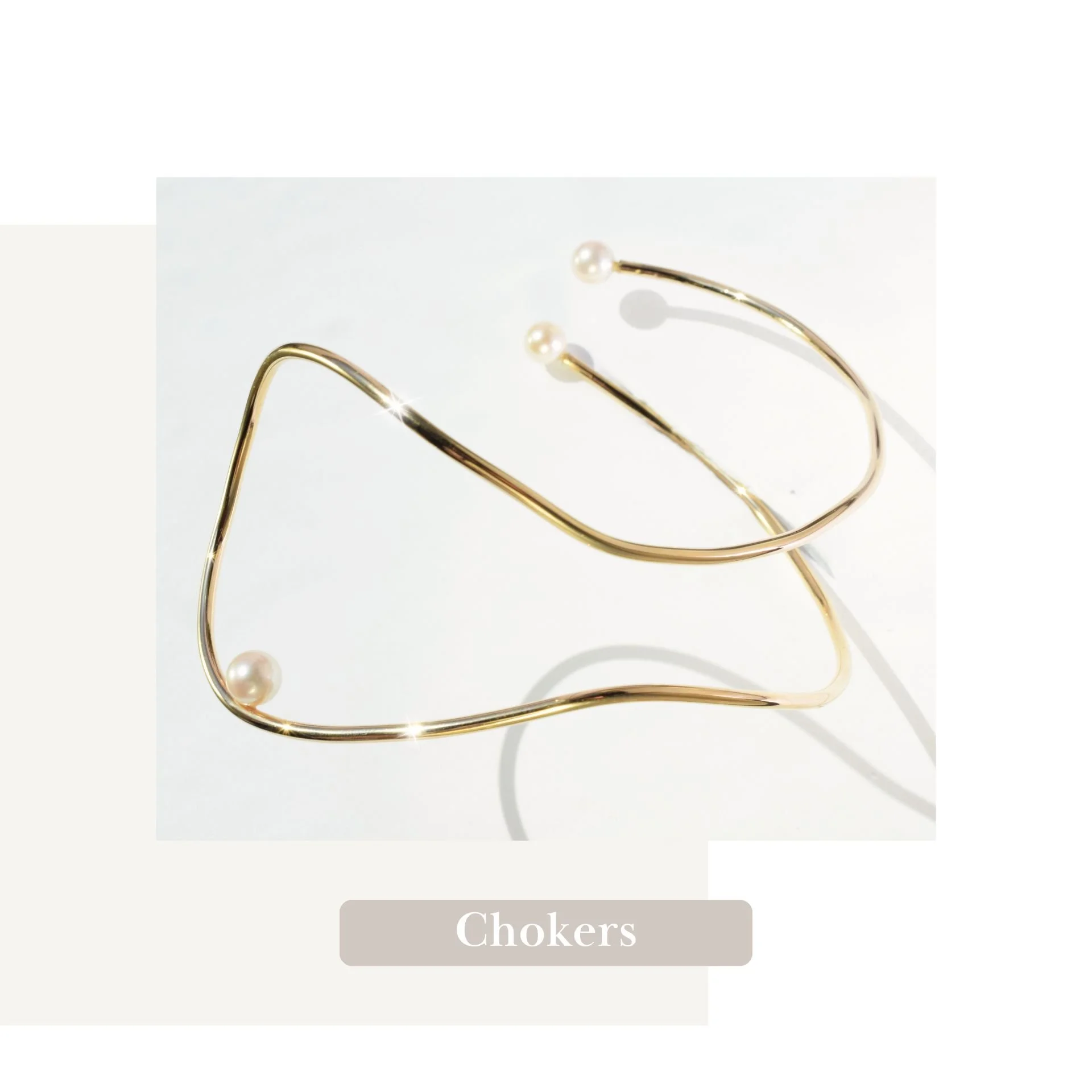 Adorn yourself in the luxury of handmade artistry with this pearl and gold choker necklace, a symbol of unique statement style designed for personal expression.