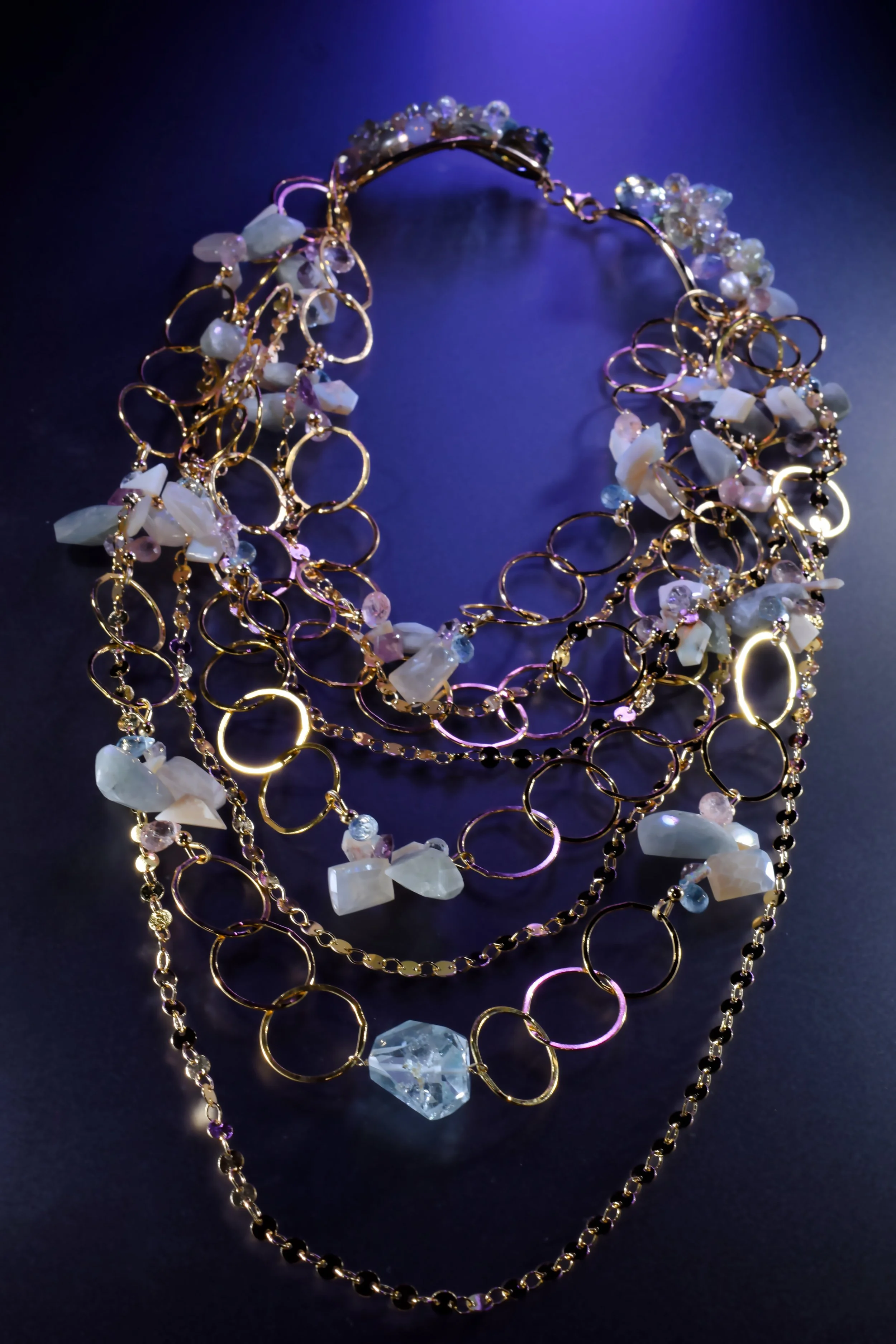 Pastel gemstone multi-strand statement necklace featuring green amethyst, keshi pearls, and gold-filled chain by jewelry designer Andrea Li