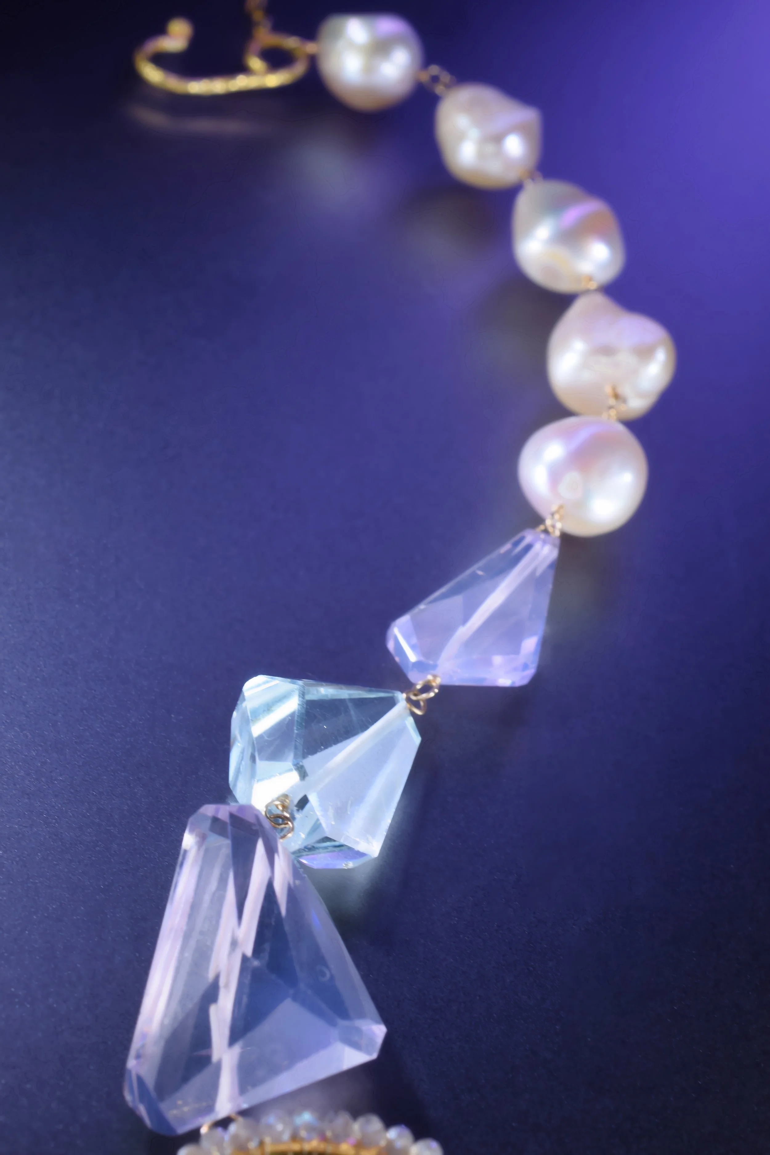 scorolite and blue topaz details with baroque pearls as a necklace chain