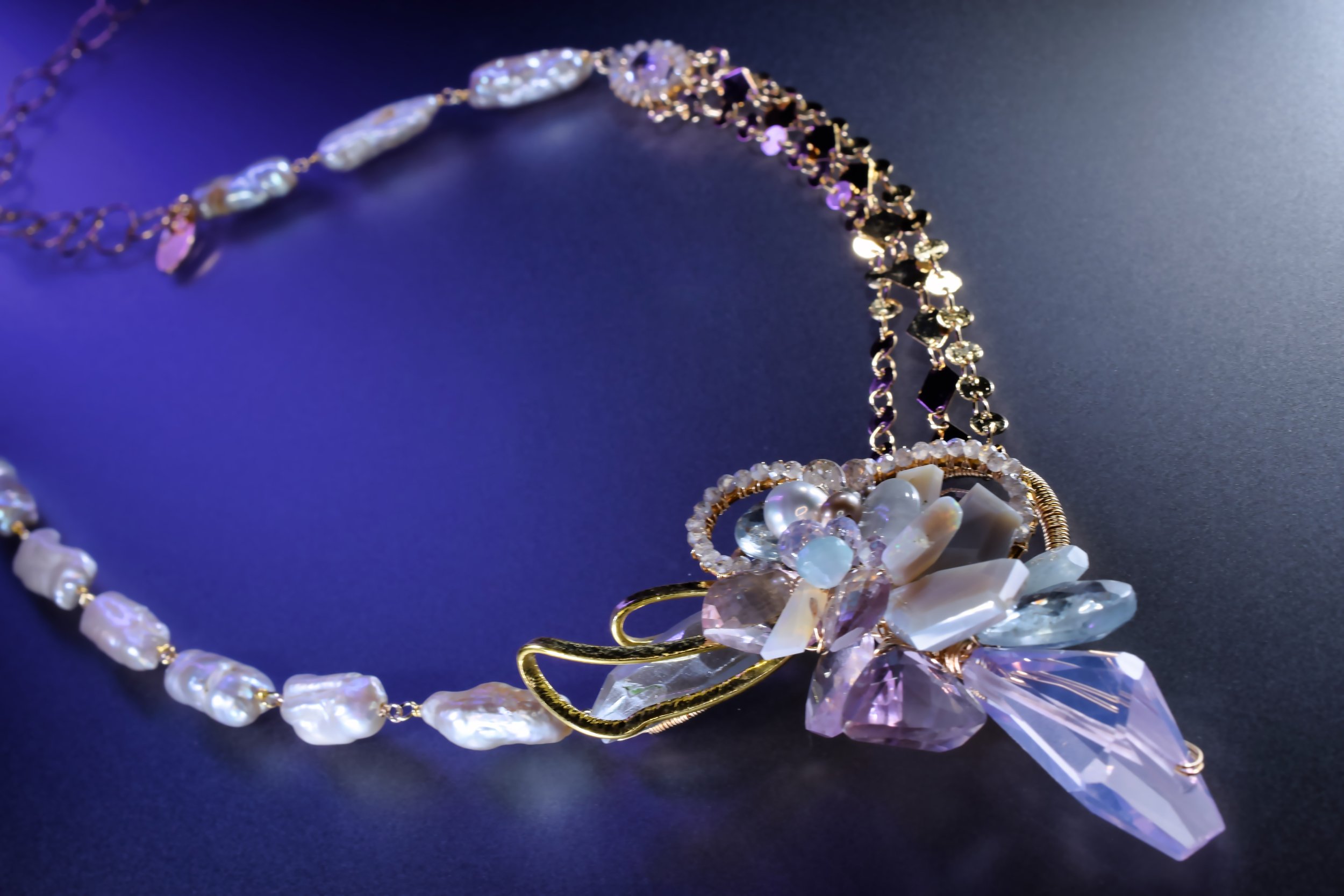 statement necklace with gemstone cluster and opals