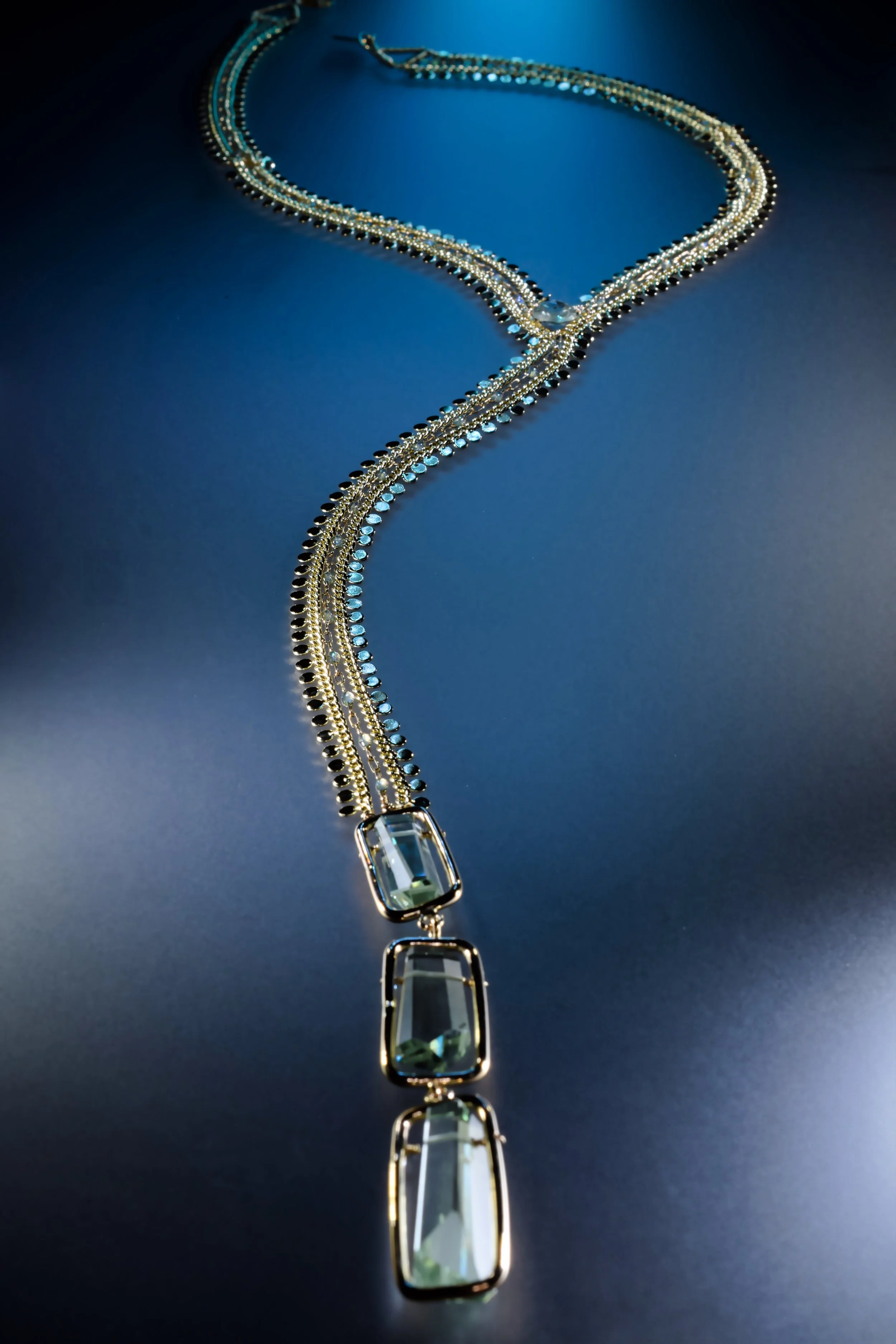 gold Y-drop necklace with green amethyst and sequin chains