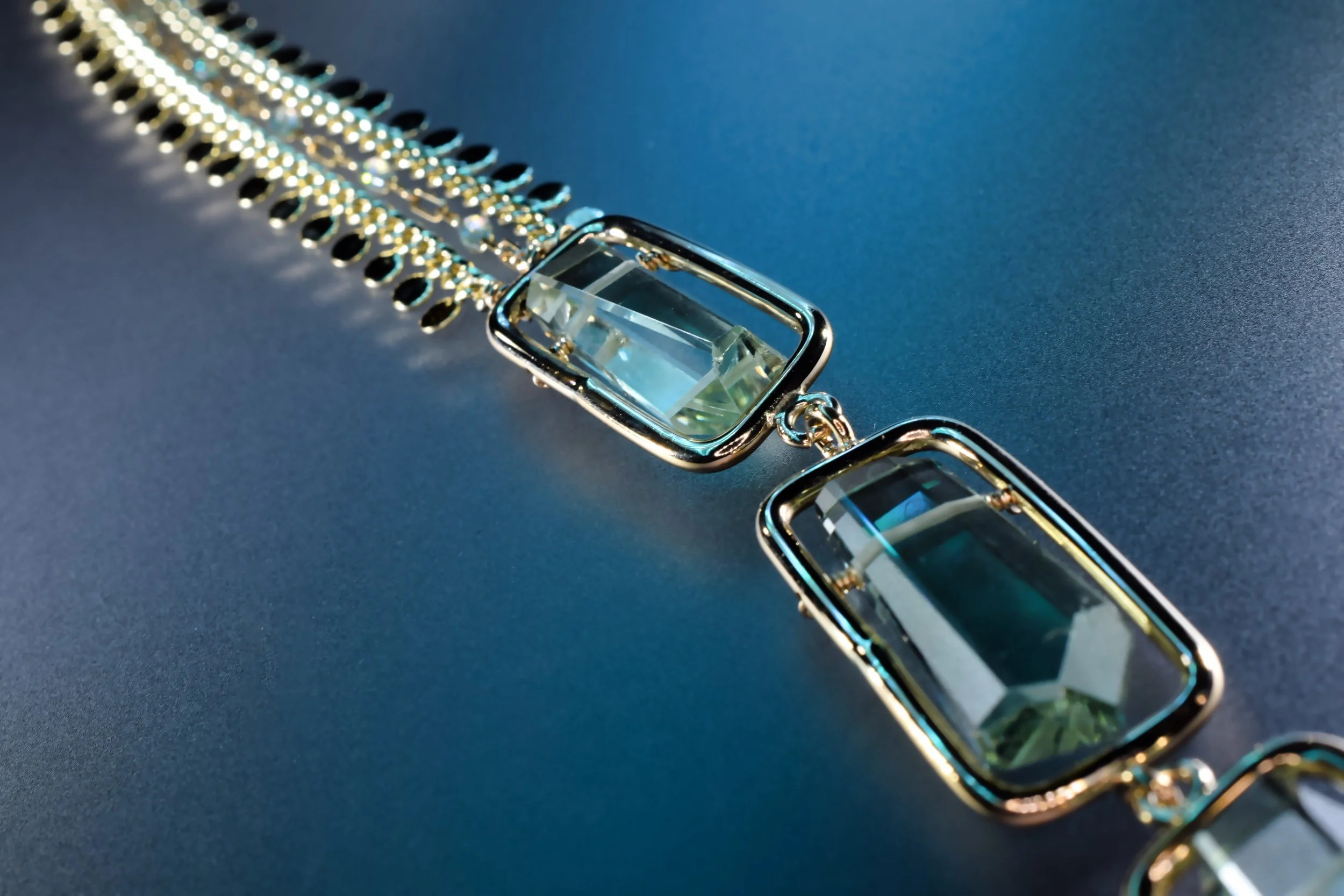 green amethyst pendant necklace with gold sequin chain