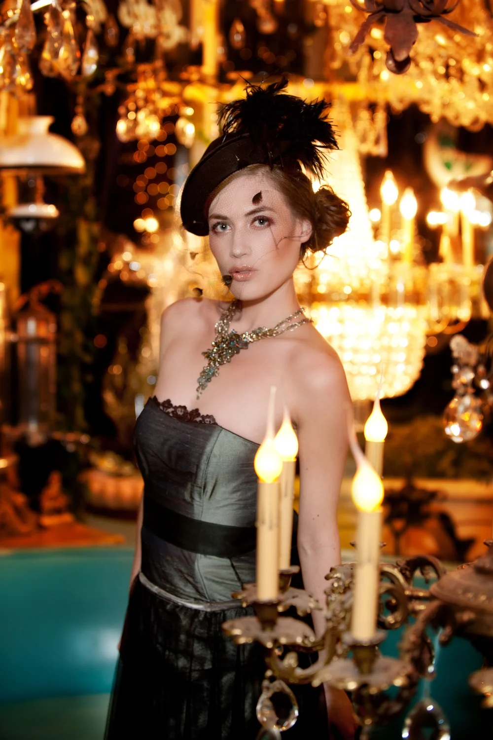Brunette woman in vintage dress with gold necklace