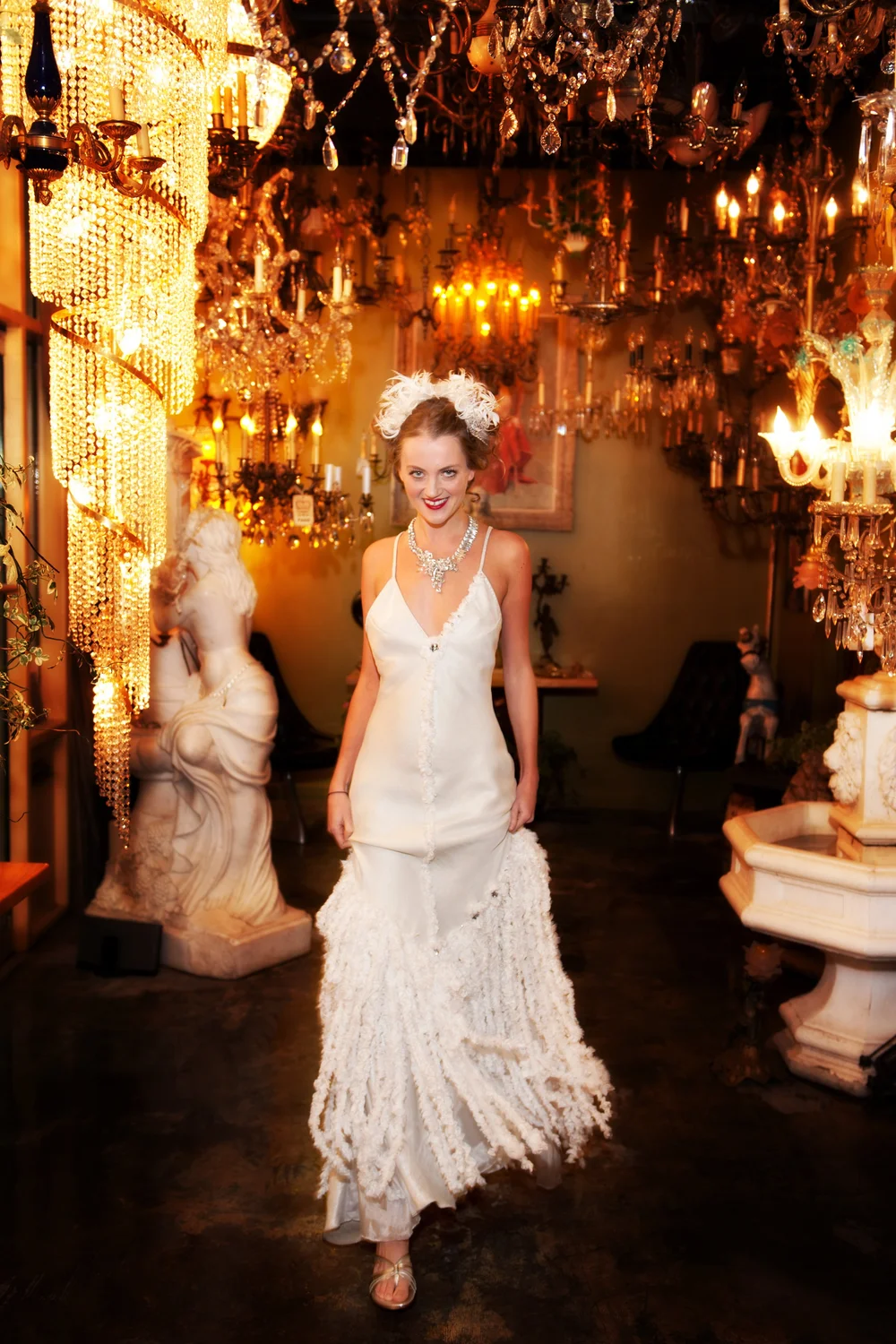 Model in a vintage outfit wearing Andrea Li vintage jewelry