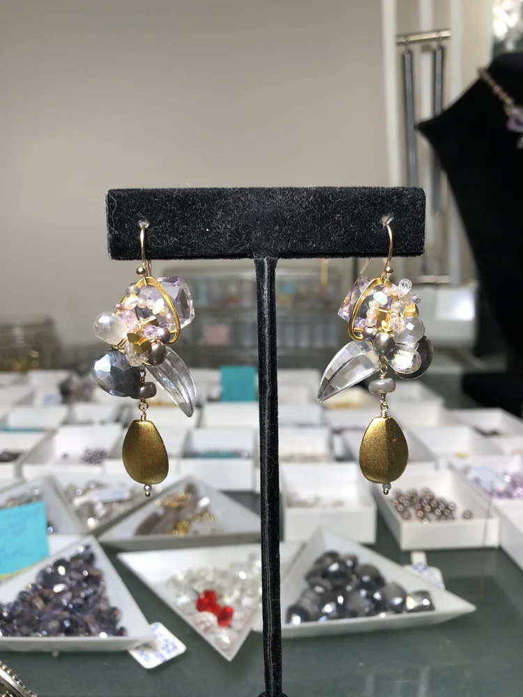 A pair of earrings hanging