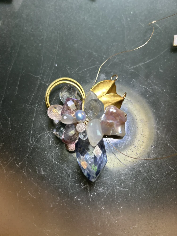 An earring being made