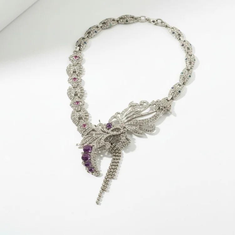 Silver vintage crystal collar with a curling cluster and a purple accent stone