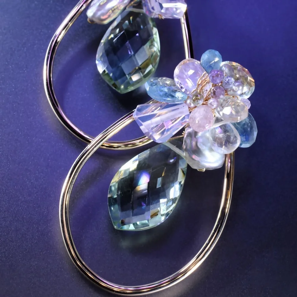 Pastel gemstone cluster earrings from the Tamar collection by Andrea Li, on purple