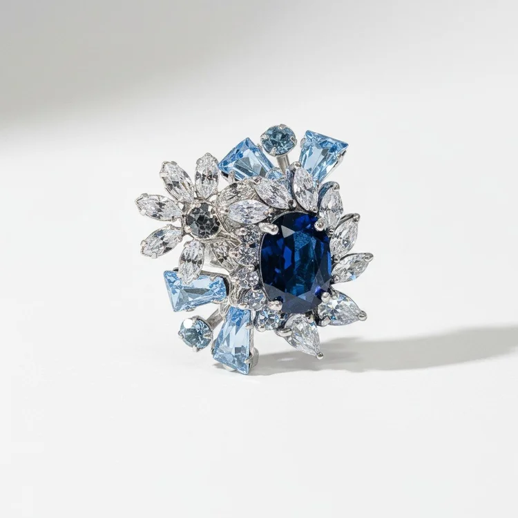 The dark blue oval ring from the front