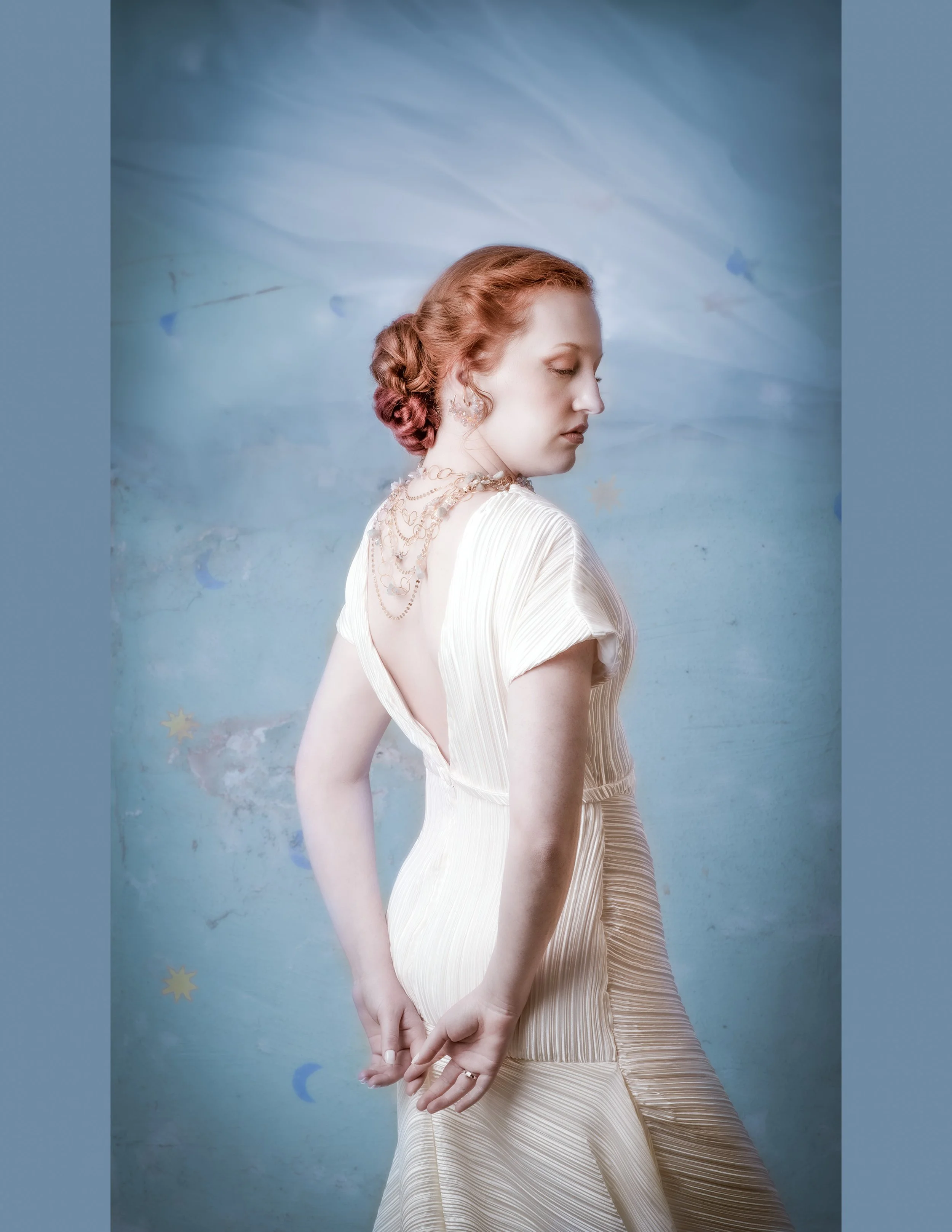 soft ethereal aesthetic of model wearing pastel jewelry
