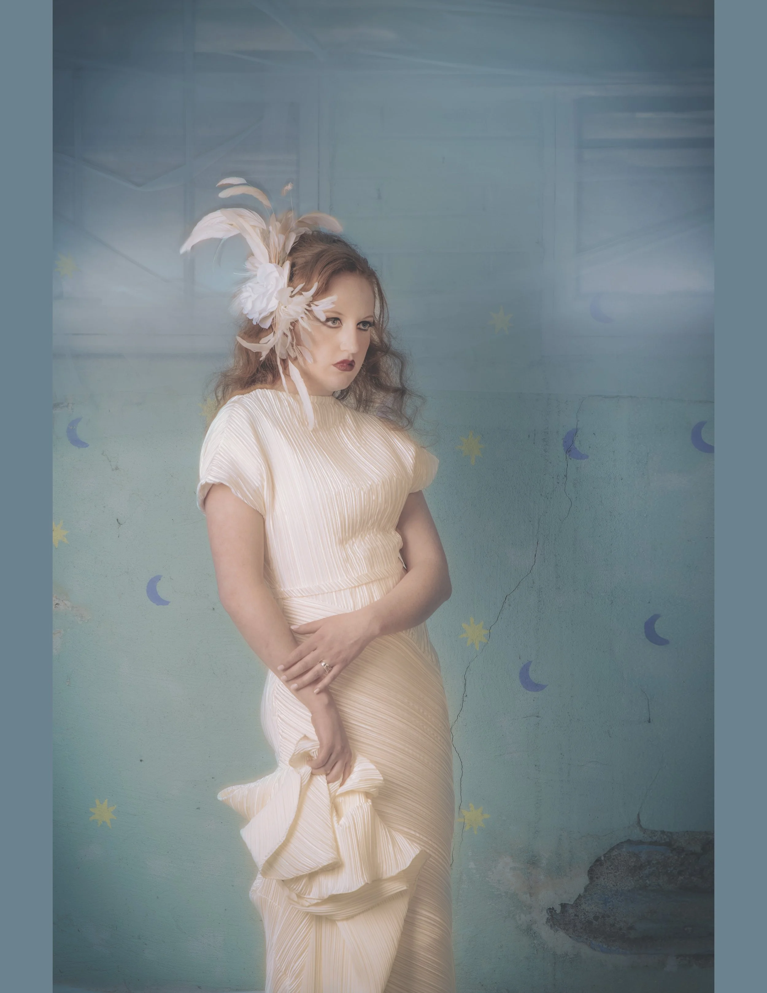soft ethereal aesthetic of model wearing pastel jewelry
