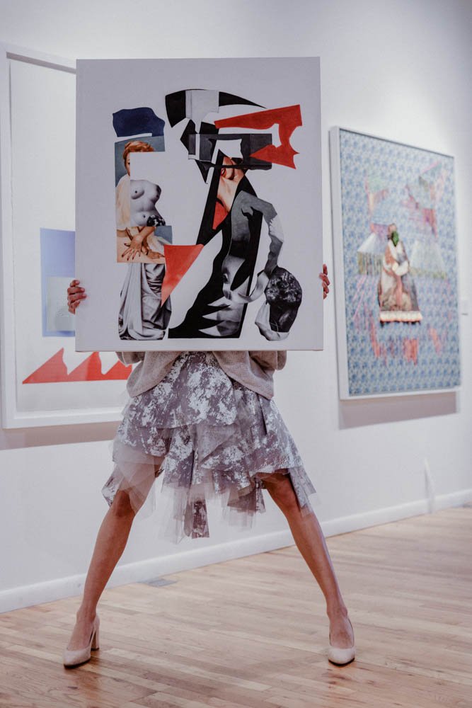 Model in an art gallery for an editorial fashion shoot with tourmaline jewelry