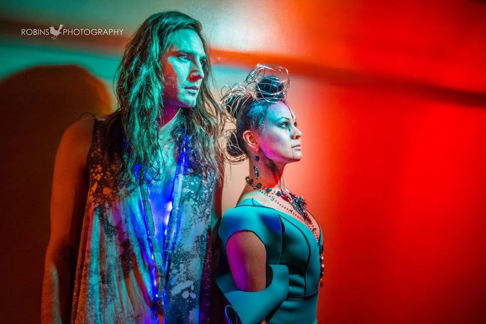 Backstage prepping for the fashion show with statement jewelry models, artists, hair and makeup artists
