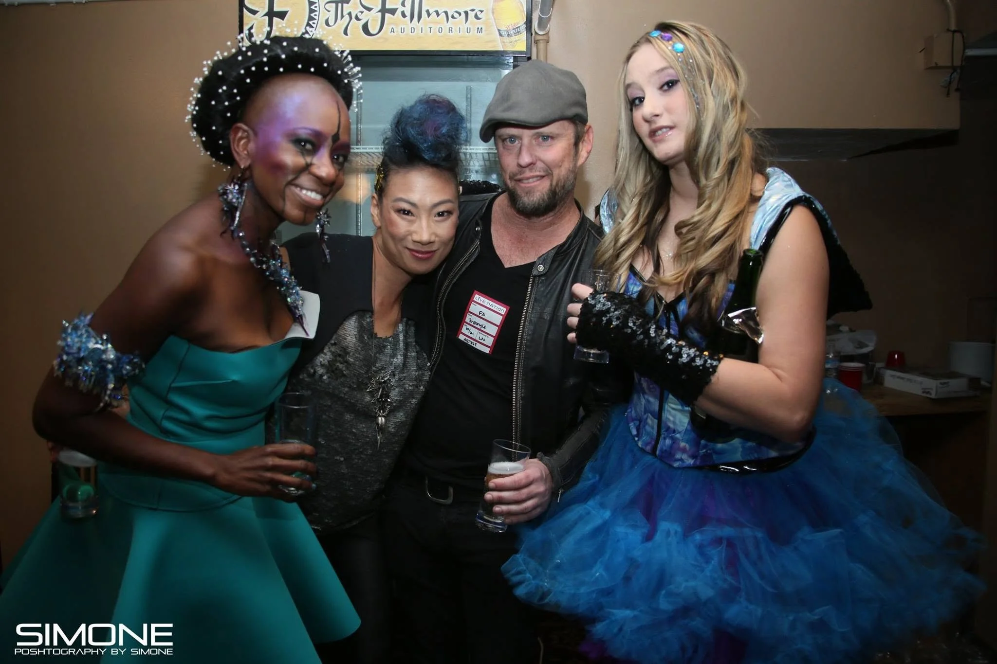 Backstage prepping for the fashion show with statement jewelry models, artists, hair and makeup artists