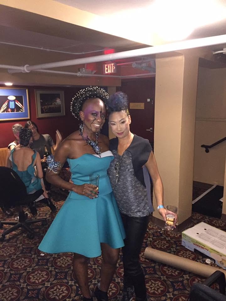 Backstage prepping for the fashion show with statement jewelry models, artists, hair and makeup artists