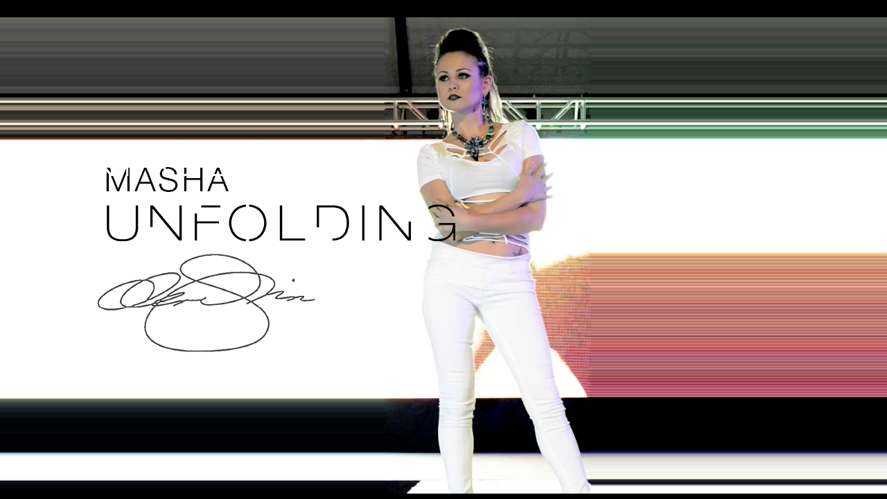 Runway model in a white cutout outfit wears a bold statement necklace beneath the title “Masha Unfolding” and a signature.