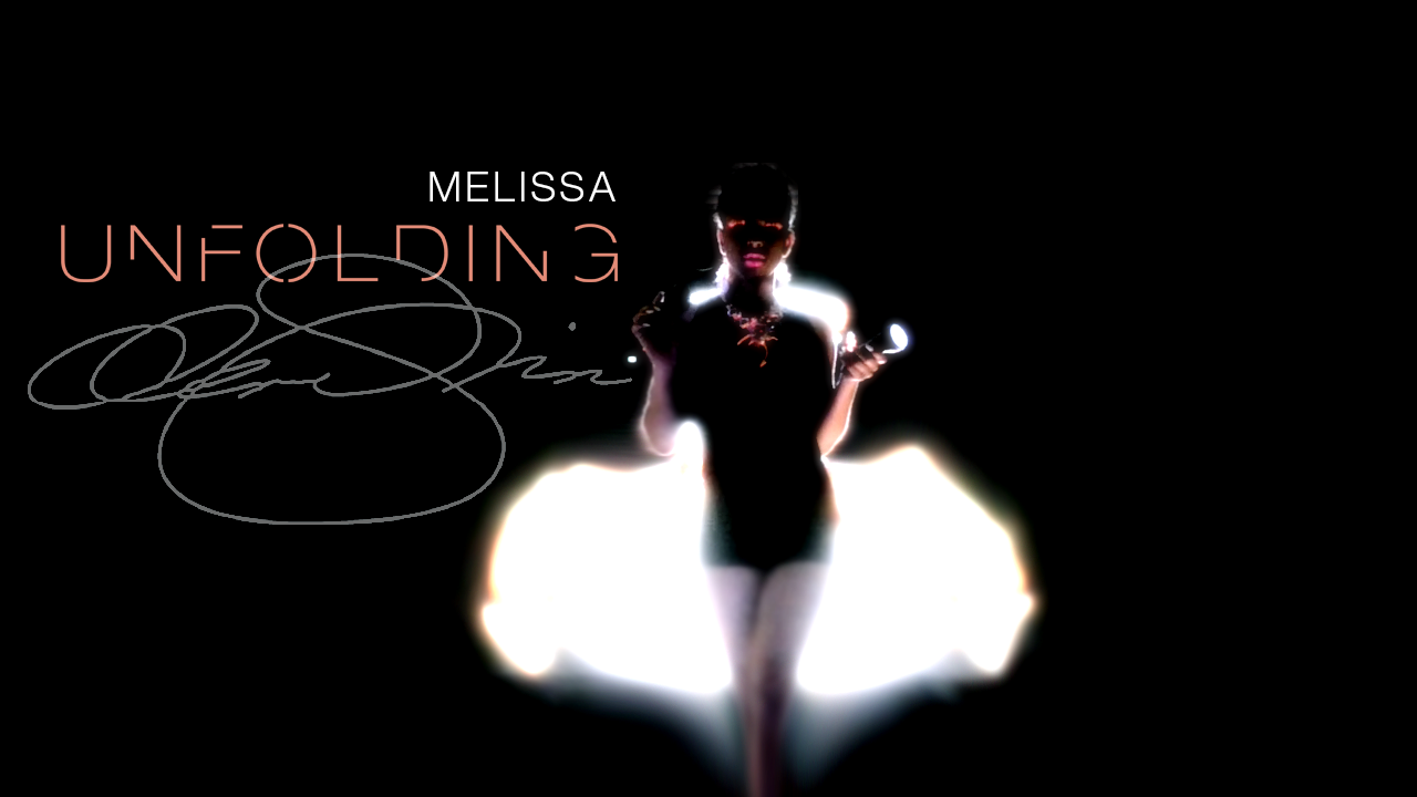 Dark runway image of a model in black and statement jewelry, backlit by glowing white forms beneath the title “Melissa Unfolding.”