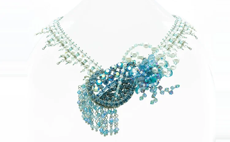 Aqua crystal and pearl fringe necklace with a cascading front