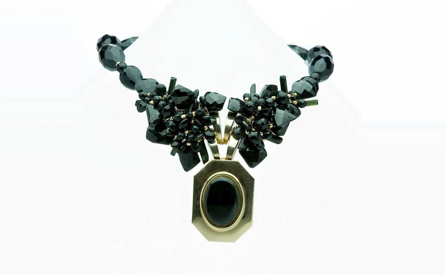 Black crystal necklace centered on a large oval cabochon pendant