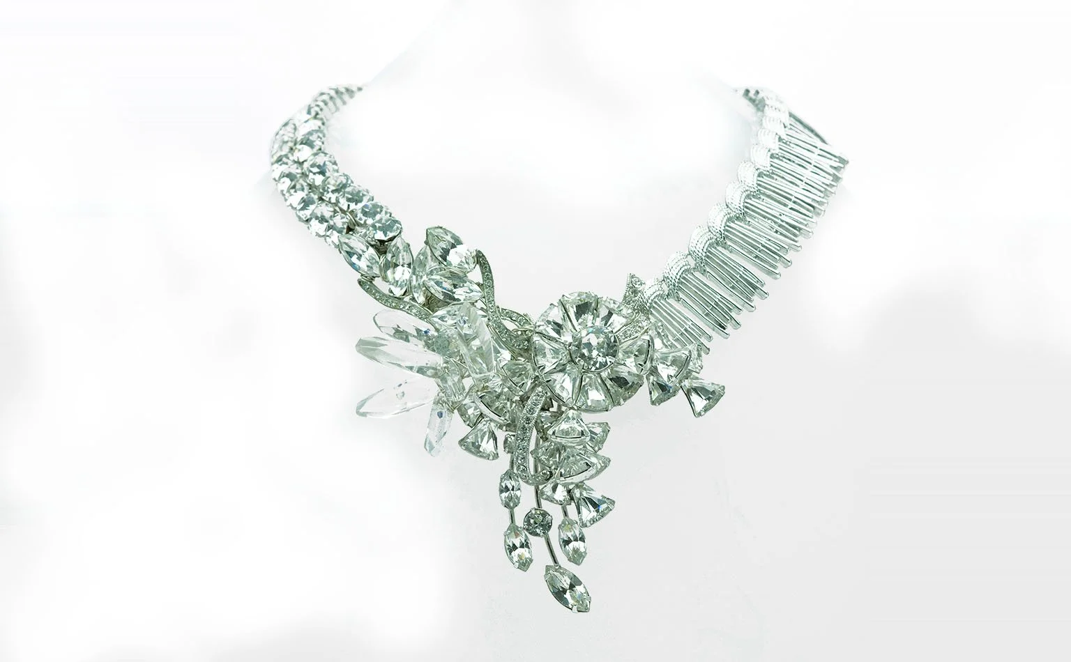 Clear crystal necklace with a spray of baguette and navette stones
