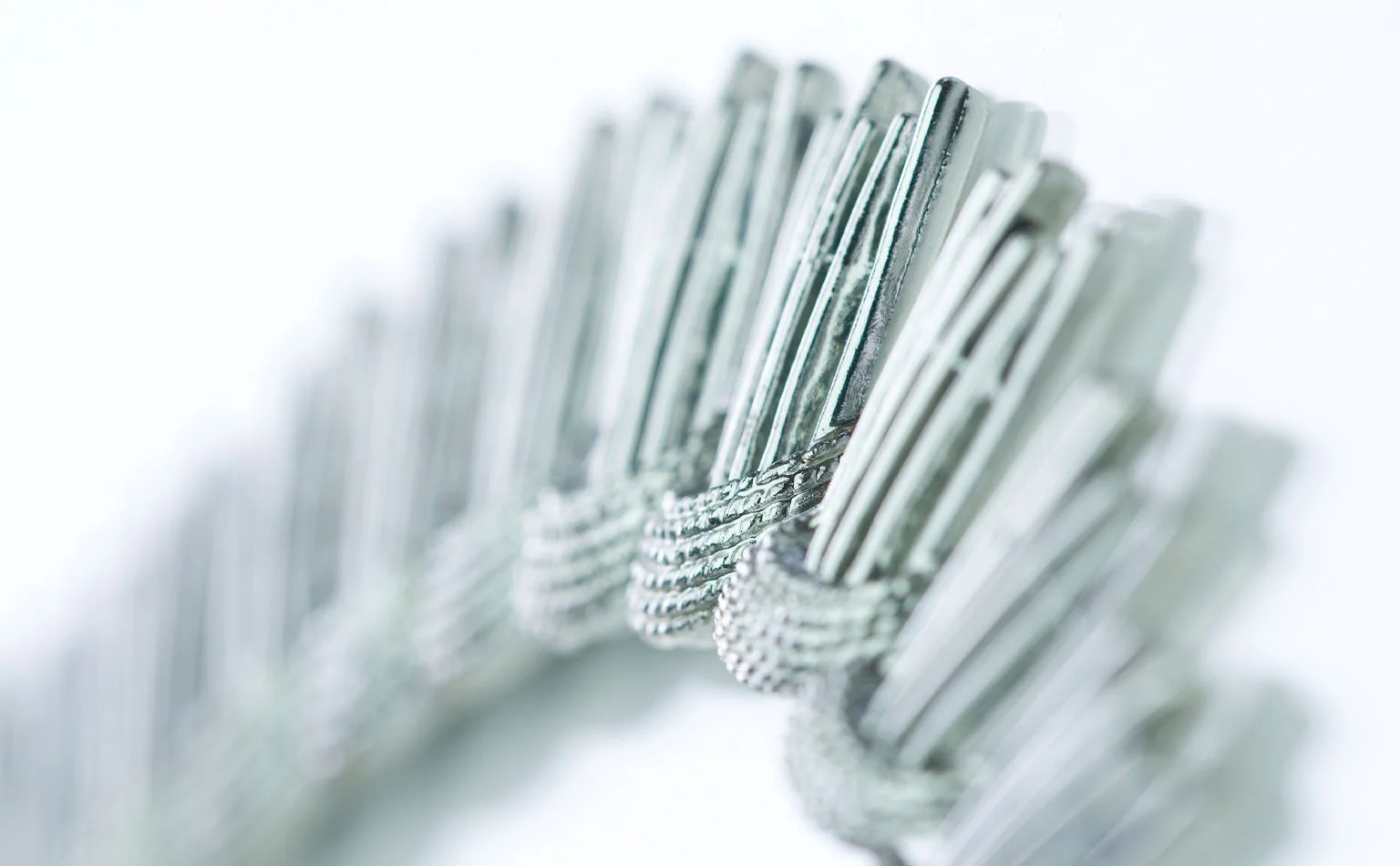 Detail of long baguette crystals fanned into a fringe 