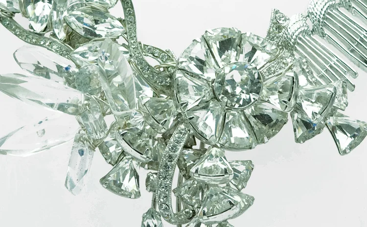 Detail of clear crystal spikes and faceted rounds in a cluster