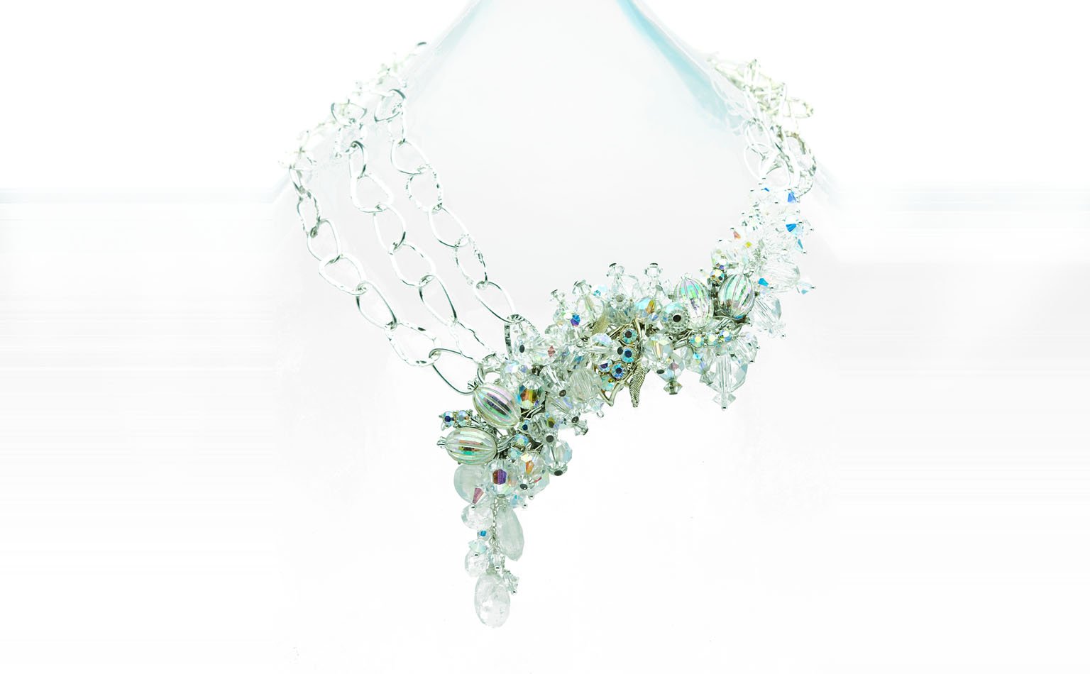 Clear crystal and silver-tone wirework necklace with a cascading front