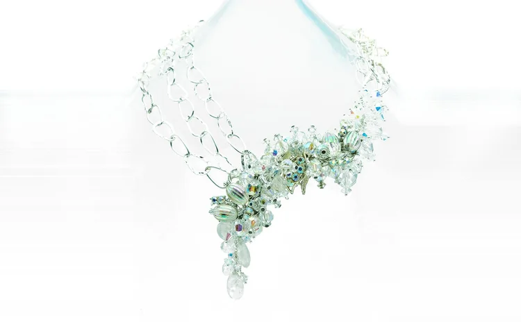 Clear crystal and silver-tone wirework necklace with a cascading front