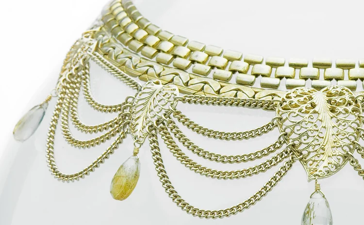Gold mesh collar with swagged chain and faceted drops