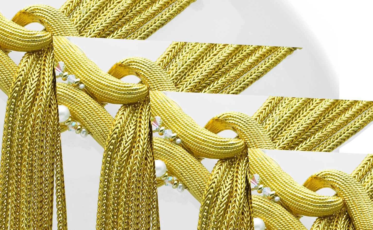 Detail of knotted gold metal mesh chains