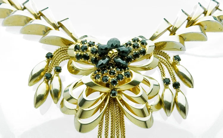 Gold leaf collar centered on a dark crystal cluster