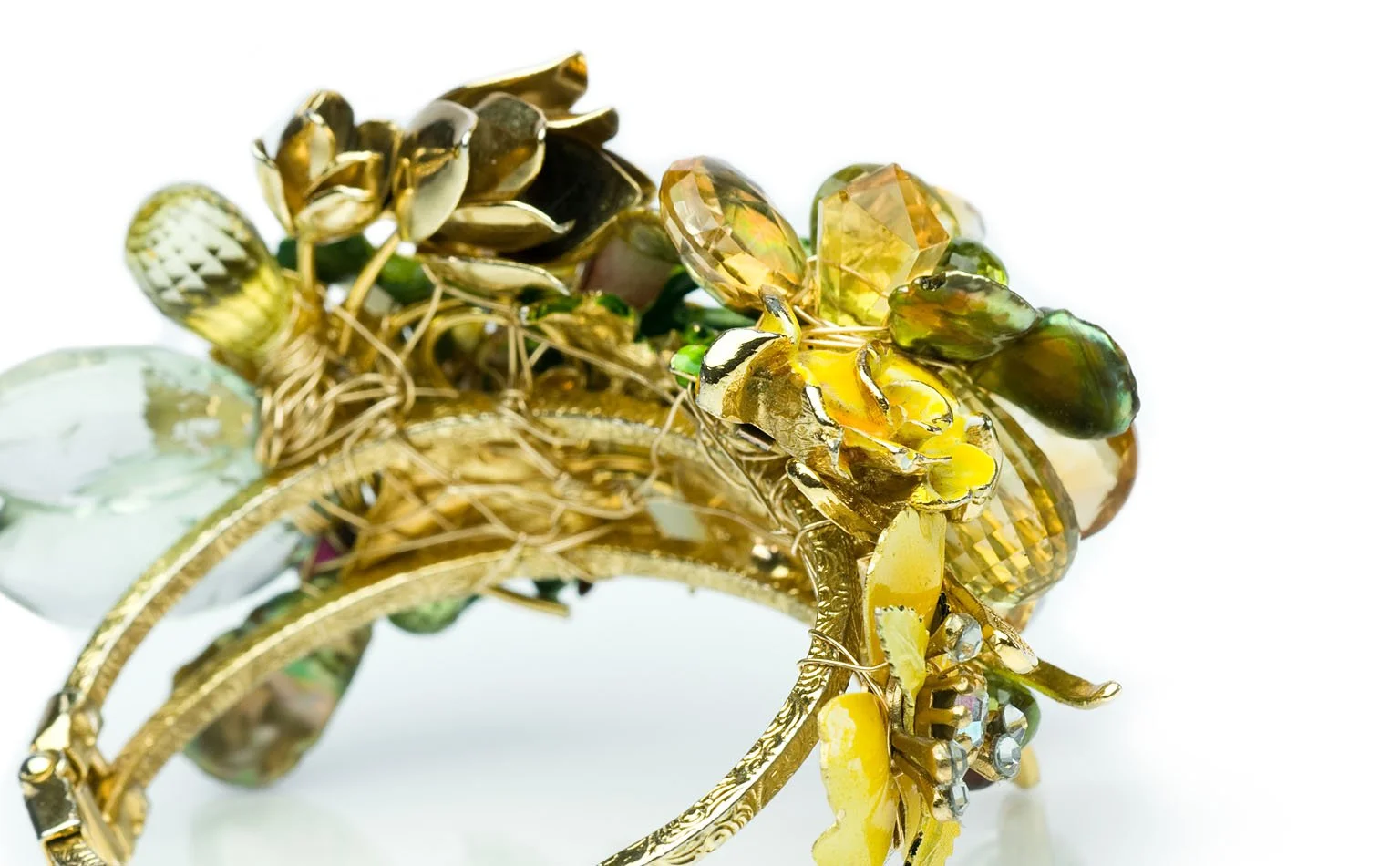 Gold cuff bracelet with yellow and green enamel flowers 