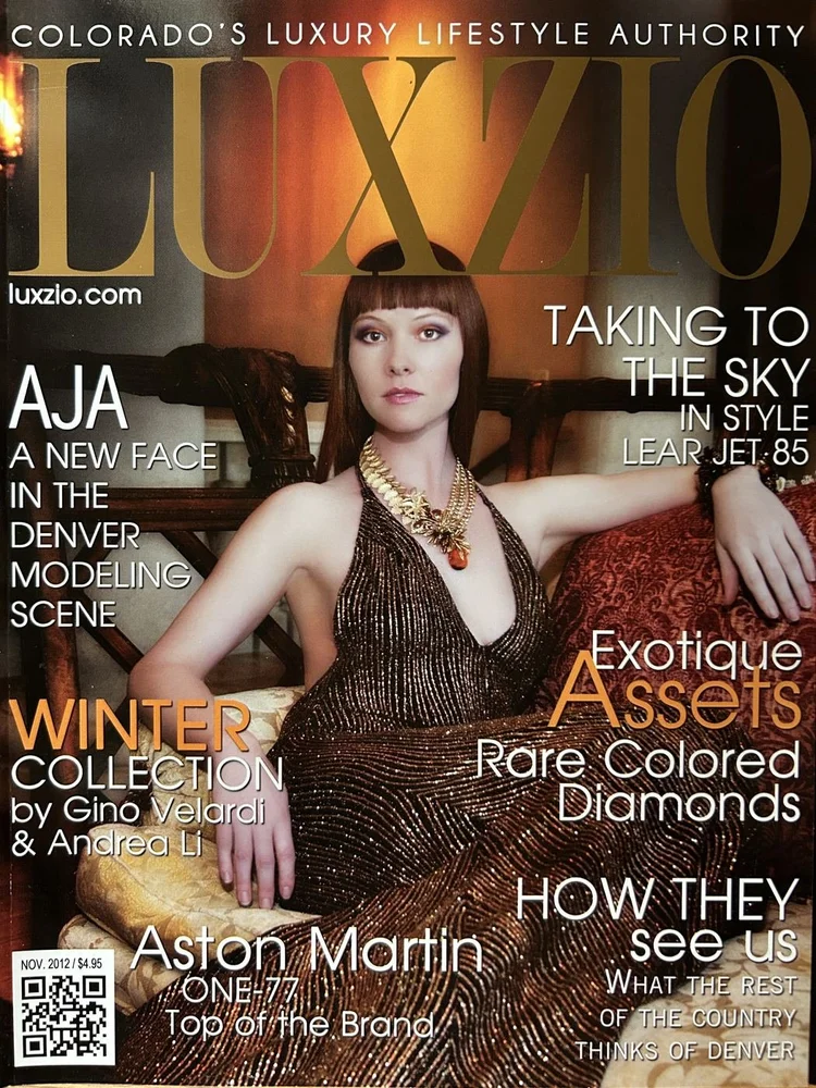 LUXZIO magazine cover, November 2012: model Aja in a bronze gown wearing an Andrea Li statement necklace