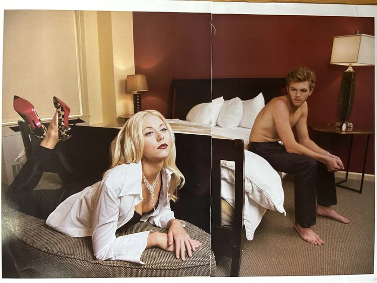 303 Magazine spread, hotel-room editorial: a blonde model in a white shirt wearing a crystal drop necklace