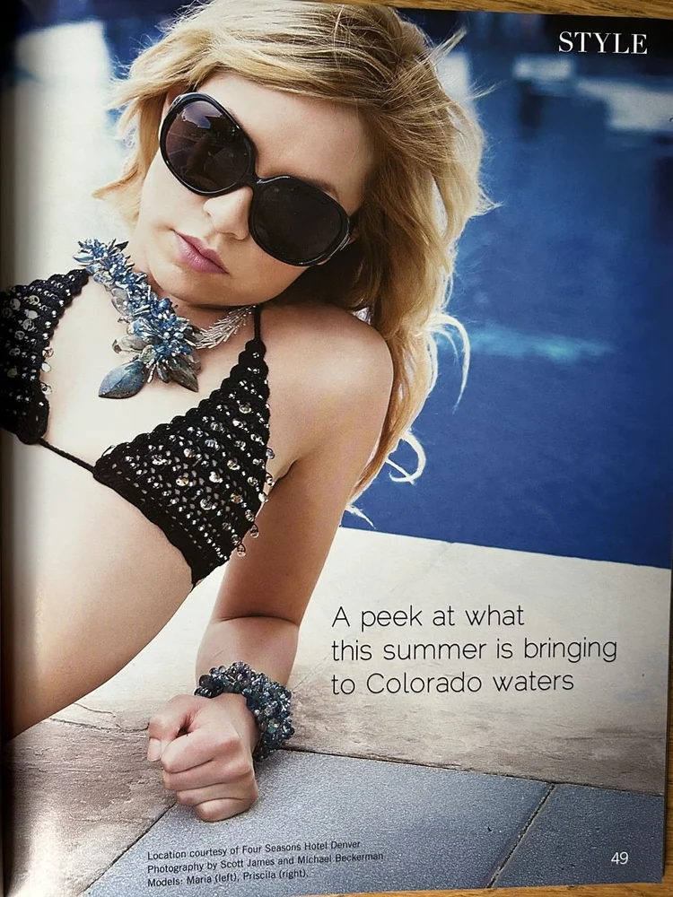 FLAIR page 49: a model in sunglasses and a black swimsuit with Andrea Li jewelry