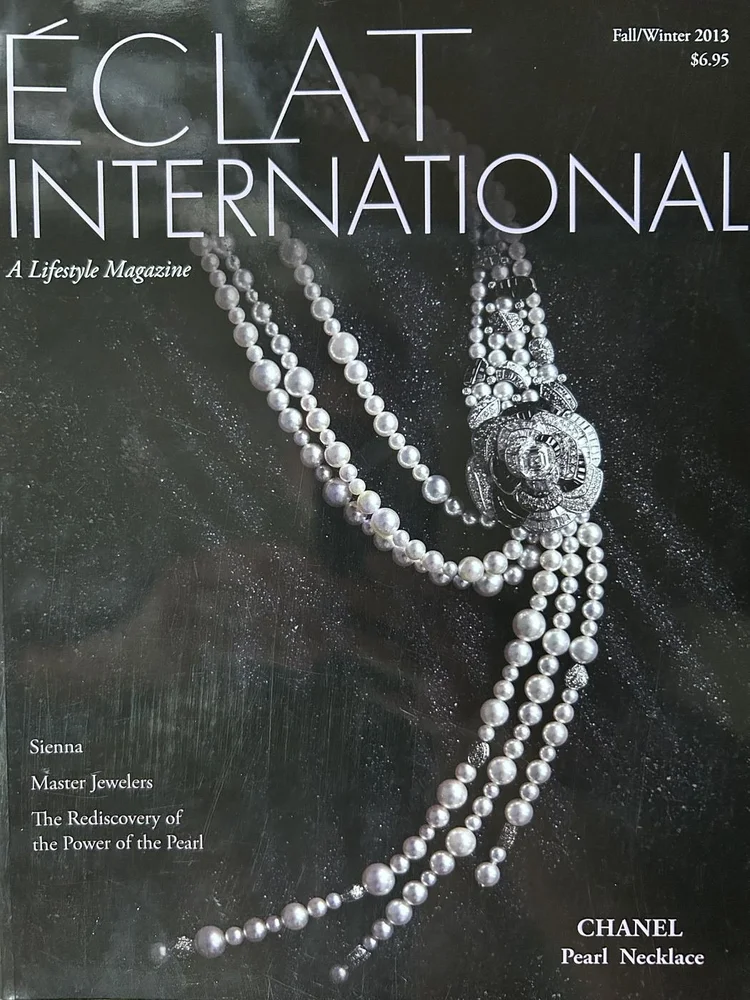 Eclat International cover, Fall/Winter 2013, a Chanel pearl necklace