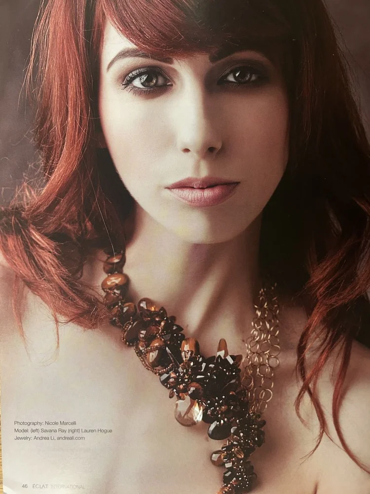 Eclat International, Summer 2015, page 46: a red-haired model wearing an Andrea Li smoky cluster necklace