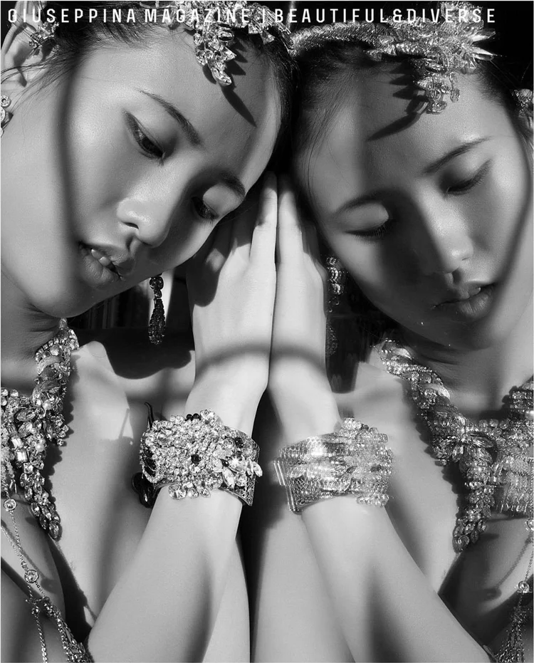 GIUSEPPINA Issue 29 back cover: The Twins, two faces resting together, Andrea Li crystal headpieces and cuffs