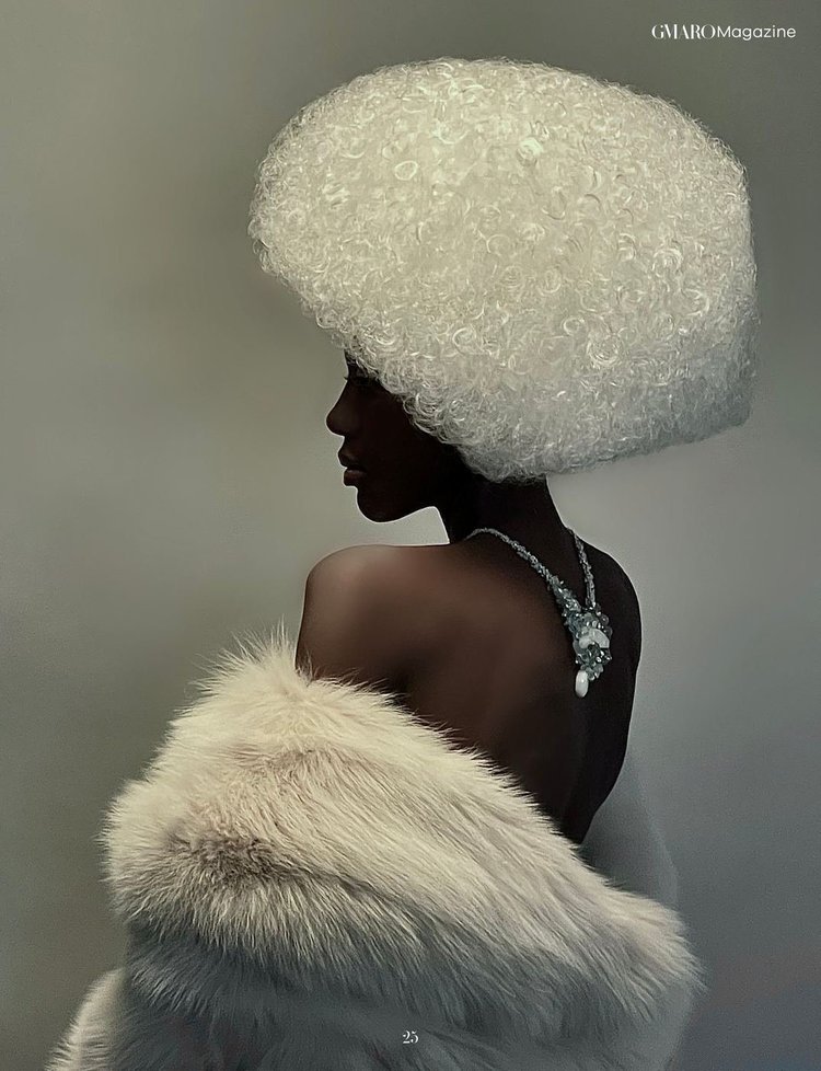 GMARO FEMME page 25: a bare back with an Andrea Li crystal back necklace and fur