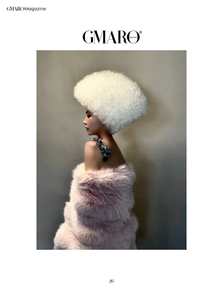 GMARO FEMME page 26: the model in pink fur in profile